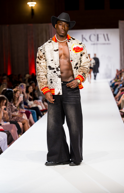 Photo of a model on the runway at KCFW (KC Fashion Week), wearing the 